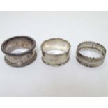 3 various silver napkin rings, one hallmarked London 1916 maker Robert Pringle & Sons.