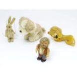 Four toys comprising a Steiff 'Mecki' hedgehog,