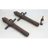 Militaria : a pair of cast iron decorative signal cannon , of sectional construction ,