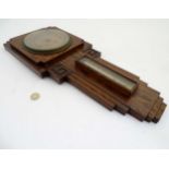 Art Deco Barometer : an Oak cased 2 glass aneroid barometer and thermometer,