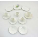 A quantity of white Shelley ceramics comprising tea plates (4) and a crocus plate (1),