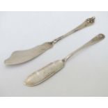 2 silver butter knives,