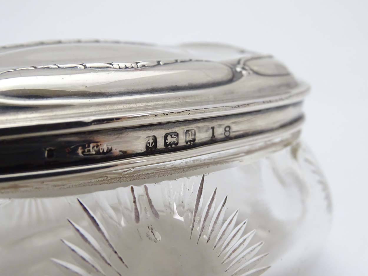 A glass dressing table pot with cut roundel decoration and silver lid hallmarked Birmingham 1910 - Image 2 of 7