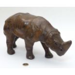 A Libertys style leather model of a rhinoceros.