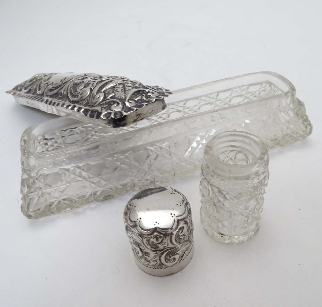 A cut glass dressing table pot with silver top having embossed decoration. - Image 6 of 8