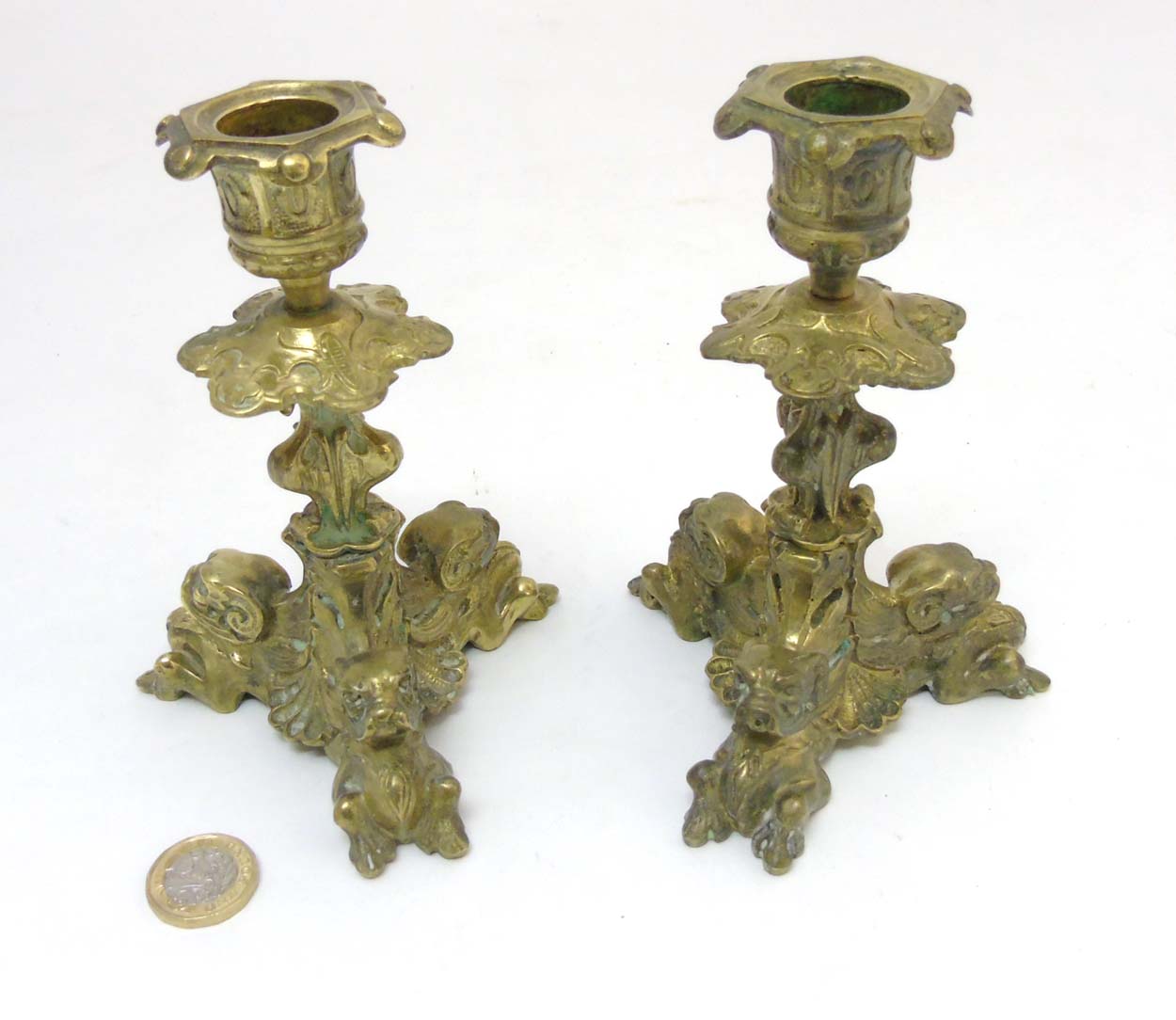 A pair of cast brass tri-form candlesticks having organic formed pedestal and 3 horned beasts to - Image 3 of 7