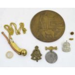 Militaria: An assortment of 20thC items , comprising a bronze WWI death plaque (William James Drew),