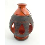 Scandinavian Studio Pottery: A c1970s Swedish tea/candle light holder of ovoid form by Norrmans,