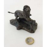 Pohani 1976 : A solid cast iron patinated bronze figure formed as a leaping lion in a naturalistic