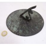 Sundial : An old bronze circular sundial with veredegris ,