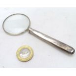 A silver handled magnifying glass 5" long overall CONDITION: Please Note - we do