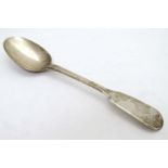A silver fiddle pattern dessert spoon hallmarked London 1843 maker WE 7"long (46g)