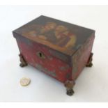 A 19thC tolepeint topped painted Dutch teacaddy 5 5/8" wide x 3 3/4" high CONDITION: