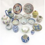 A quantity of oriental ceramics, comprising a lidded ginger jar,