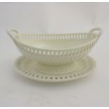 A 19th century Wedgwood reticulated creamware chestnut basket,