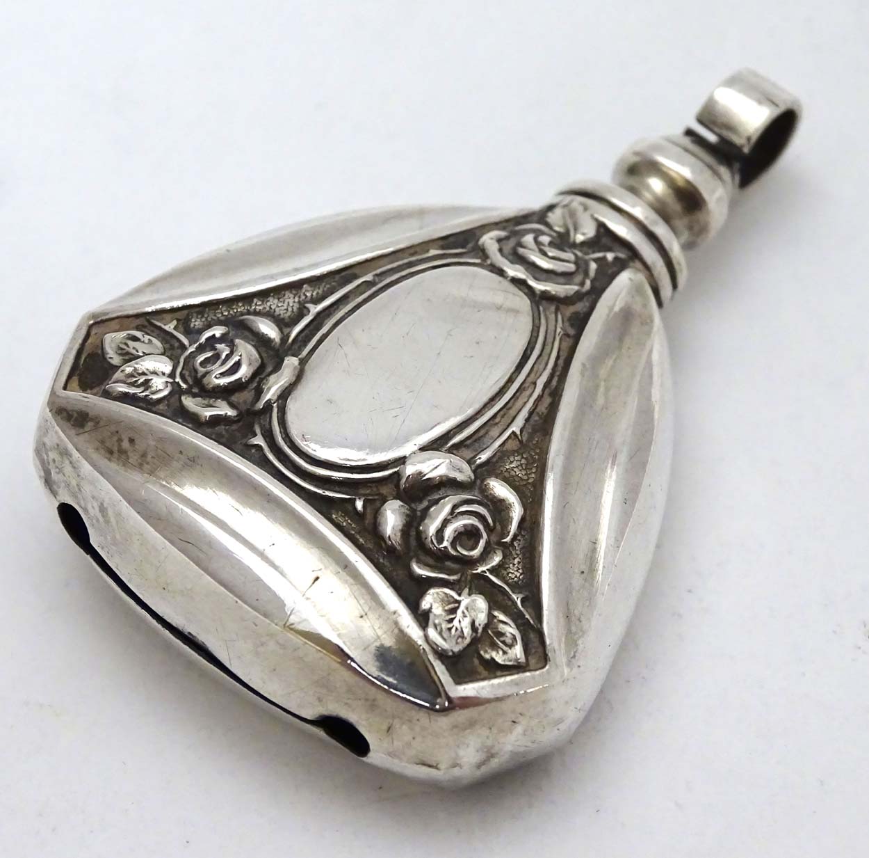 A Continental 800 silver pendant rattle with rose decoration 2 1/4" long CONDITION: - Image 3 of 5
