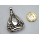 A Continental 800 silver pendant rattle with rose decoration 2 1/4" long CONDITION: