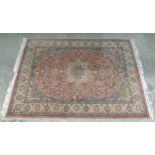 Rug Carpet : an Indian hand made Woollen Kaimuri carpet with light rust ground having foliate