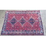 Rug / carpet :three diamonds to centre on a wine red background , many birds , and blue , white ,