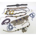 Assorted Native American Indian and tribal inspired jewellery to include a white metal necklace set