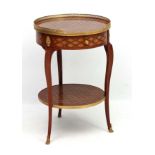 A late 19thC / early 20thC French marquetry 2-tier circular centre table / etage with ormolu