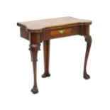 A George II mahogany card table with castellated ends,