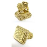 Desk Seal : a yellow metal pendant seal ,