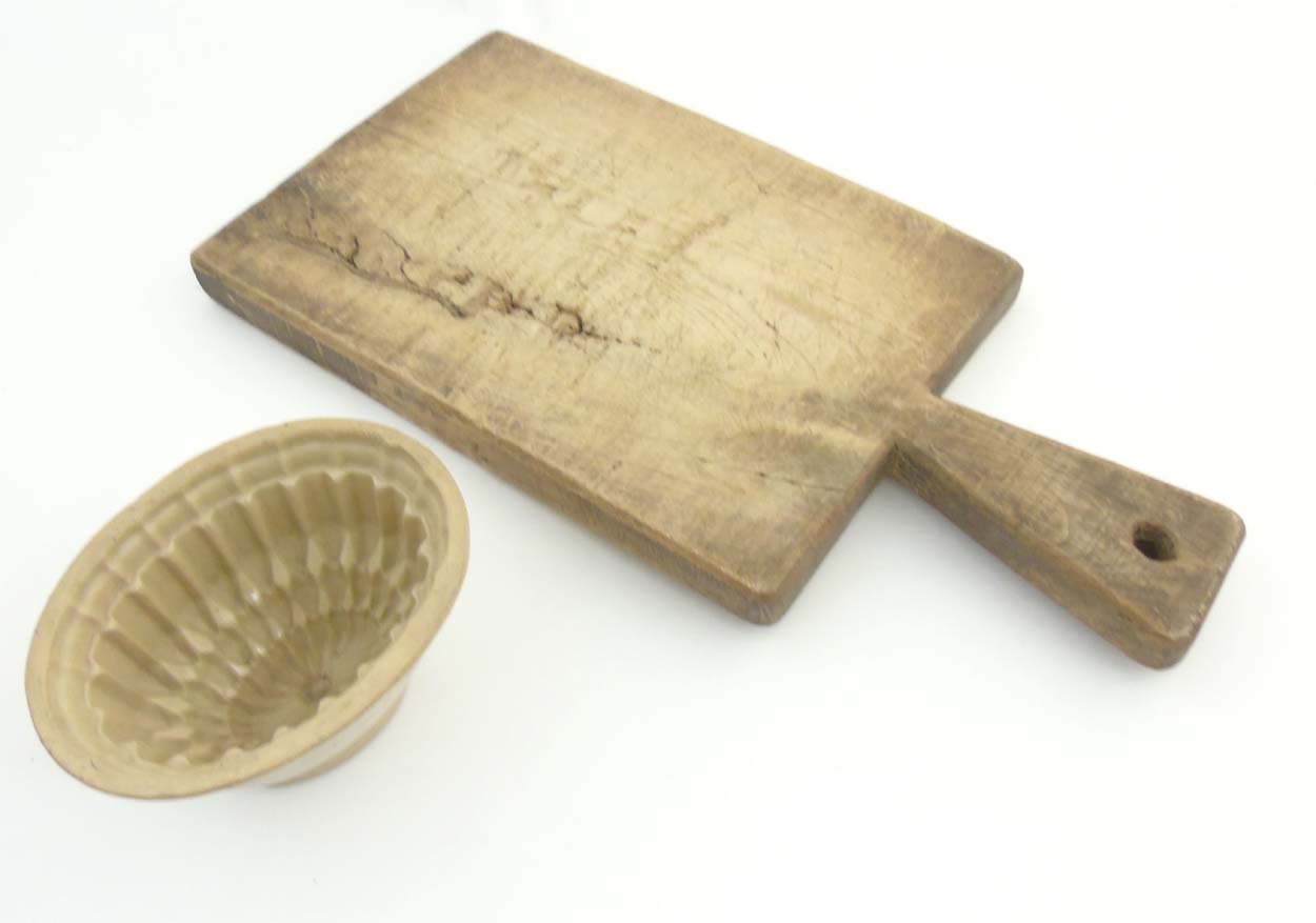 A old sawn Elm Bread Board and a ceramic oval jelly mould ,