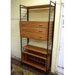 Vintage Retro : A British Ladderax wall mounted set of shelves and assorted cupboards.
