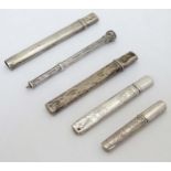 Assorted silver and white metal pencil holders including one hallmarked Birmingham 1900 maker E.