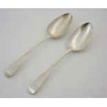 A pair of Geo III Old English Pattern table spoons hallmarked London 1807 maker Peter & William