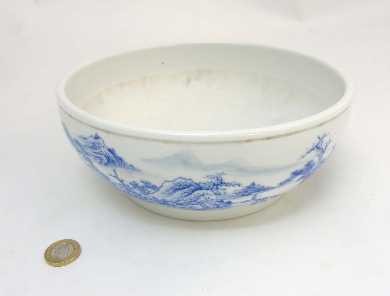 A Chinese blue and white bowl decorated in an underglaze blue continuous landscape and iron red - Image 3 of 8