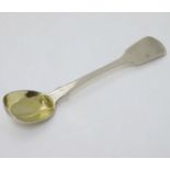 A fiddle pattern mustard spoon with gilded bowl.