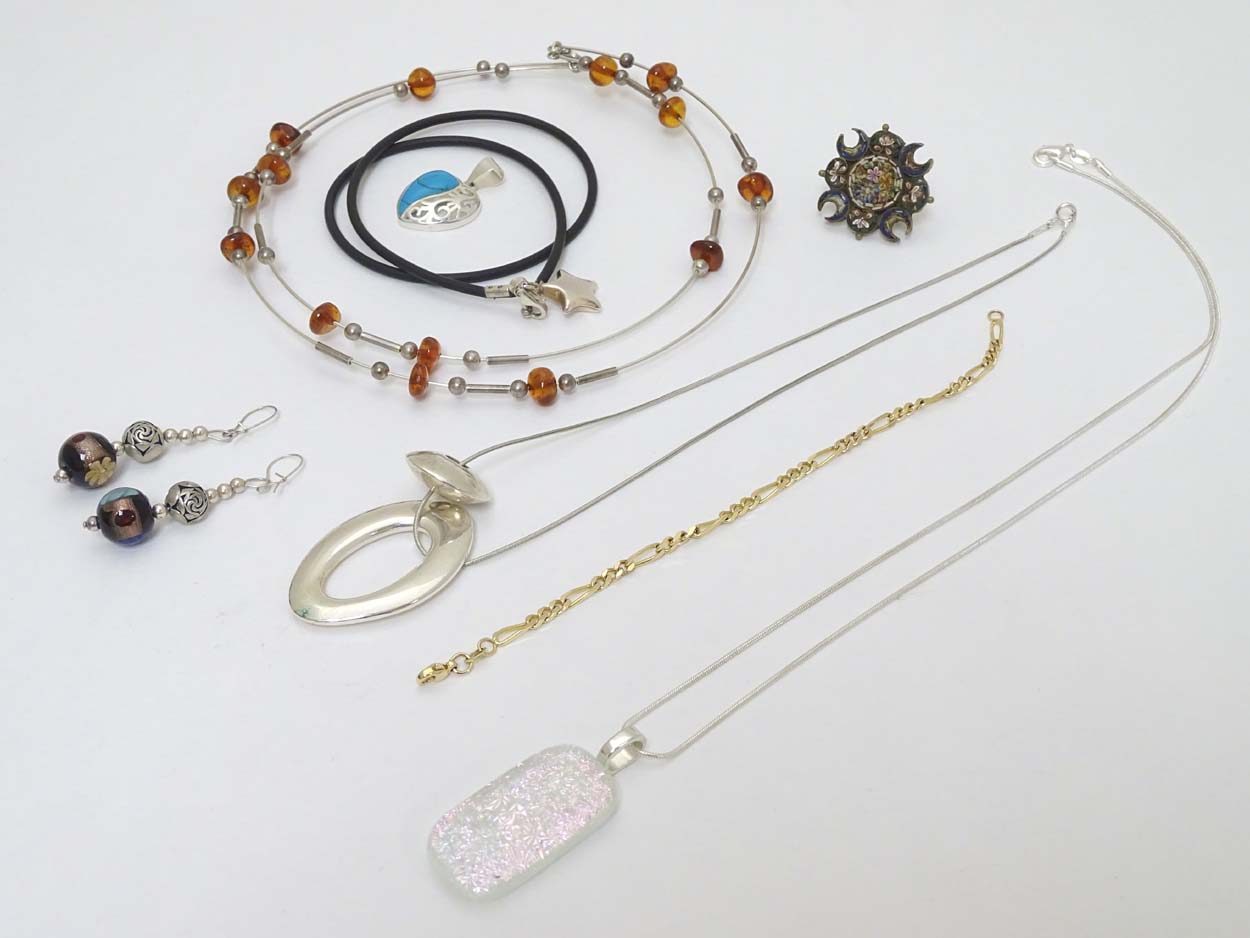 Assorted jewellery to include silver pendants,