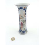 A Chinese Famille Rose vase of tall cylindrical form with flared rim,