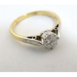 A gold ring set with diamond solitaire CONDITION: Please Note - we do not make