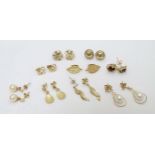 9 various pairs of 9ct gold and yellow metal earrings including examples set with pearls etc