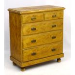 A Victorian pine Chest of Drawers comprising two short over three long drawers,