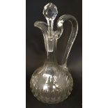 A cut glass jug with loop handle.