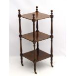 A 19thC mahogany étagère / whatnot, with three tiers inlayed with boxwood stringing,