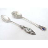 A Silver souvenir spoon for the Franco - British exhibition of 1908 depicting enamel decorated