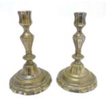 A pair of 18thC spun and silvered brass seemed candlesticks 7 1/2" high CONDITION: