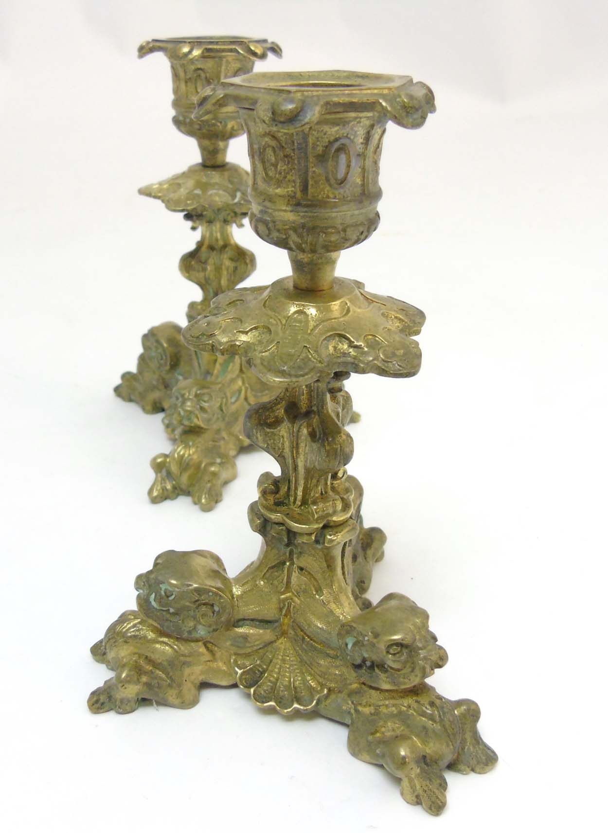 A pair of cast brass tri-form candlesticks having organic formed pedestal and 3 horned beasts to - Image 2 of 7