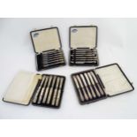 Cased sets of various silver handled cake forks and butter knives(4 cases) CONDITION:
