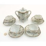 A Japanese part tea set, comprising a two handled sugar bowl and cover,