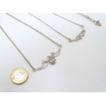 3 silver necklaces with decoration inspired by Rennie Mackintosh designs.