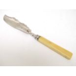 A silver butter knife with ivory handle. Hallmarked Birmingham 1845.