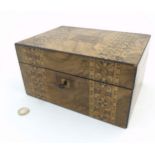 A 19thC walnut banded sewing box with fitted lift out section and inlaid decoration to the outer.