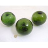 Glass : 3 x 19 thC green glass fishing net floats , each with pontil scars ,