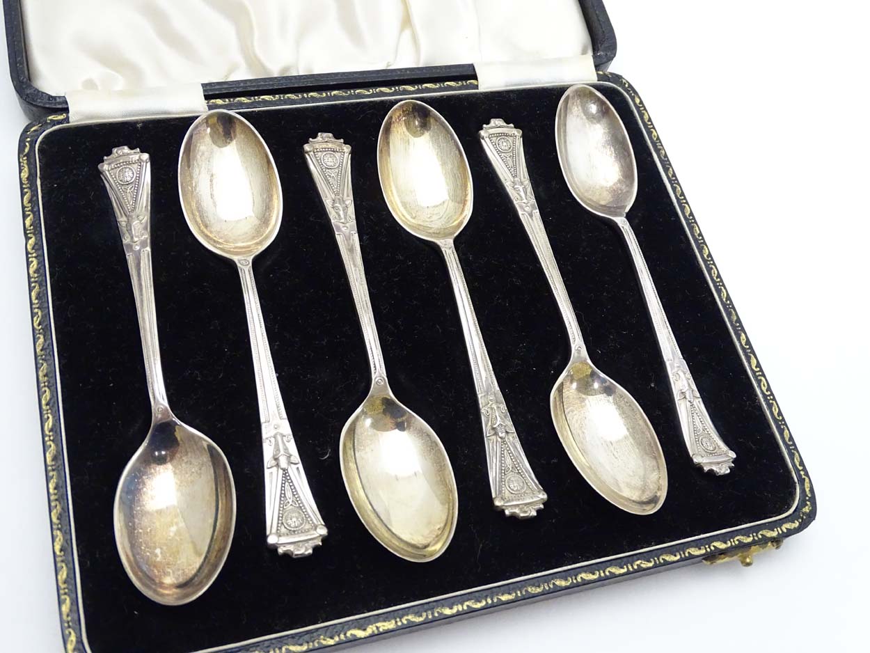 A cased set of 6 silver teaspoons having unusual celtic like decoration with wild boar head detail. - Image 3 of 13